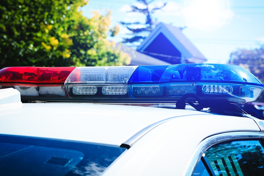 Police Car Red Emergency Lights Flashing at Night