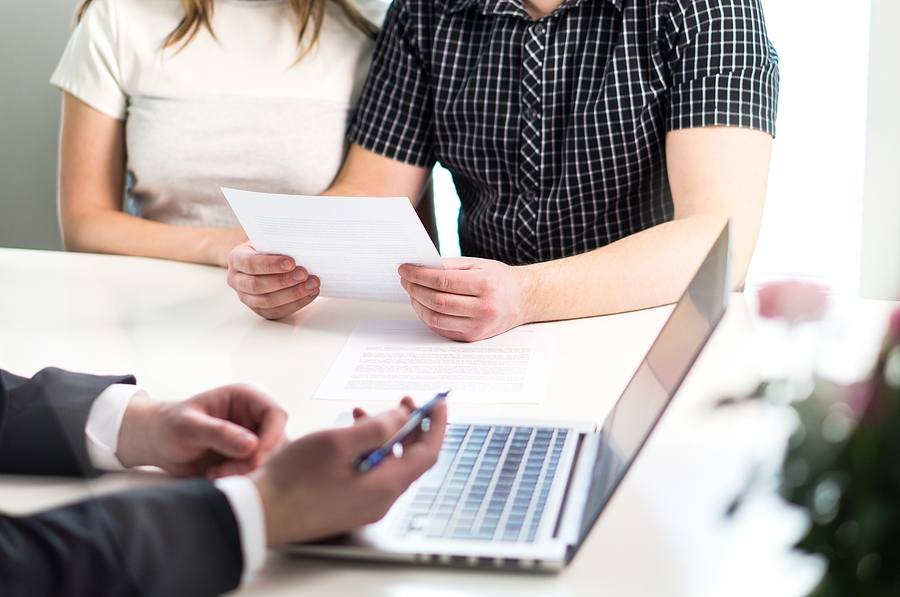 Group of business professionals discussing recoverable damages in personal injury case