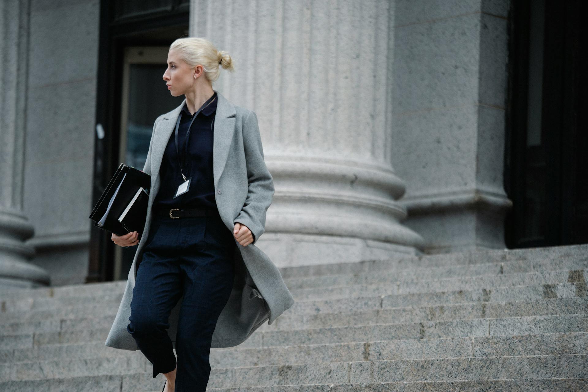Professional woman walking down from court