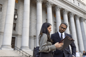 Client debriefing with a personal injury attorney to discuss important new questions about an injury case that is ongoing